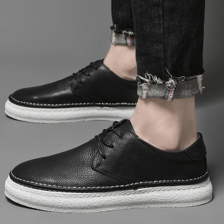Crafted genuine leather men's Oxford shoes, classic lace-up design ensuring comfort and style.