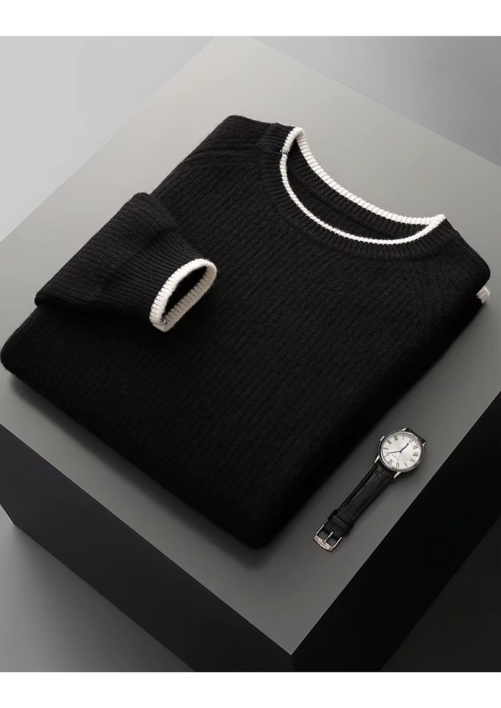 Man enjoying an outdoor setting in a comfortable and stylish crew neck knitted sweater.