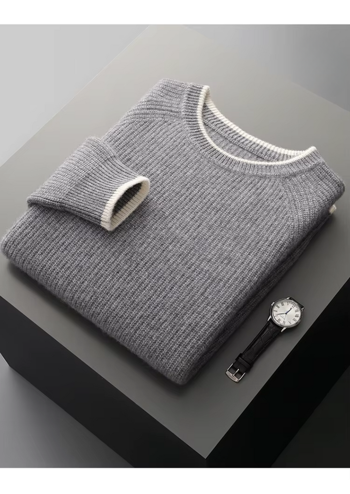 Relaxed man in an elegant crew neck knitted sweater, suitable for home or smart casual office.