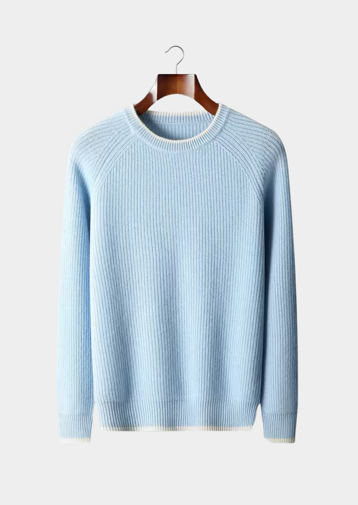 Man in casual wear, sporting a stylish dark grey crew neck knitted sweater.
