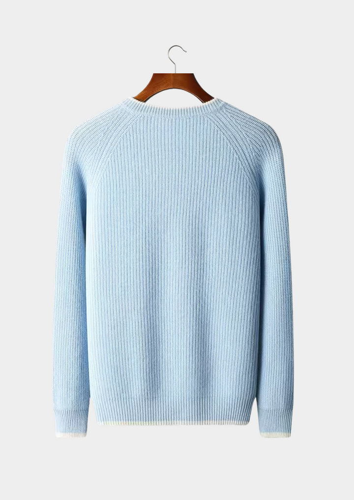 Smart casual outfit with a man wearing a versatile navy blue crew neck knitted sweater.