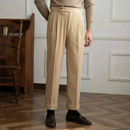 Classic men's corduroy trousers, high-waisted, soft cotton, tailored for comfort and vintage appeal.