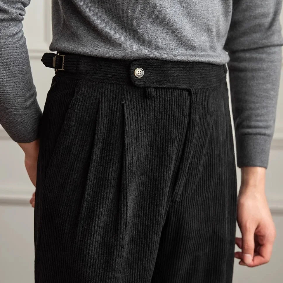 Durable men's work pants: classic high-waisted pleated design, tailored for comfort and vintage style.