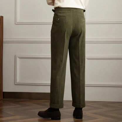 Tailored men's classic trousers, high-waisted and pleated, perfect for a smart casual or office look.