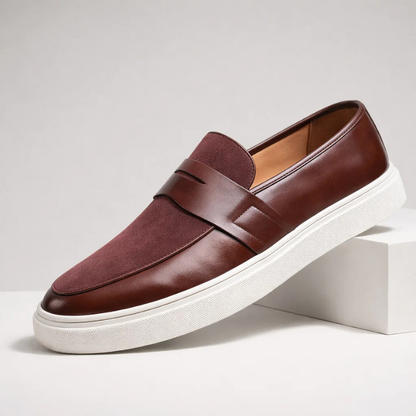 Sleek men's black Italian penny loafers, essential dress shoes for sophisticated everyday style.