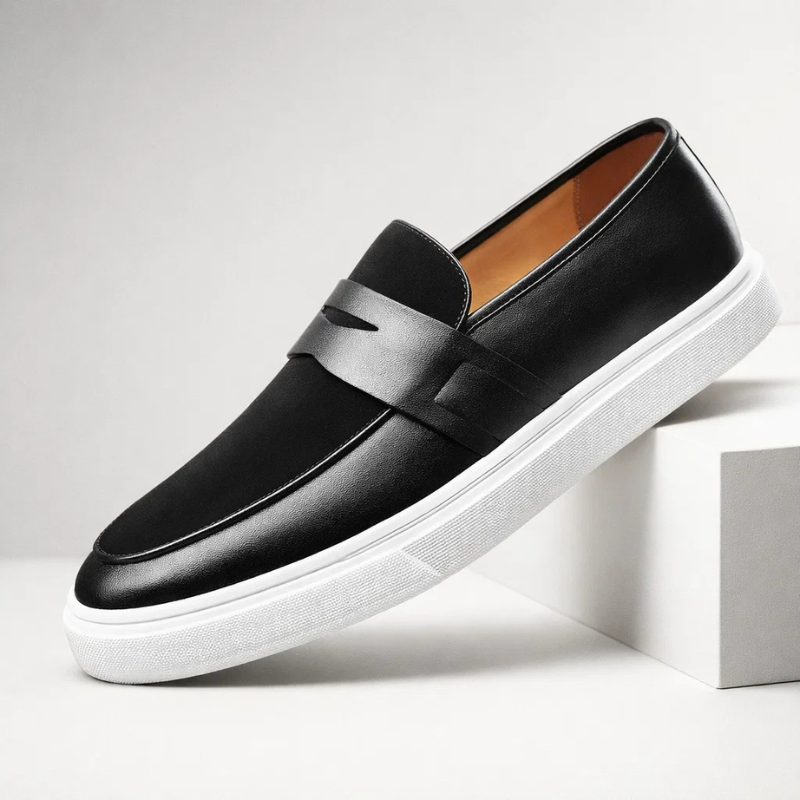 Handcrafted men's Italian leather penny loafers with a timeless design for ultimate comfort.