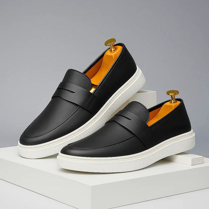 Men's classic Italian penny loafers, a stylish and comfortable slip-on choice for modern fashion.