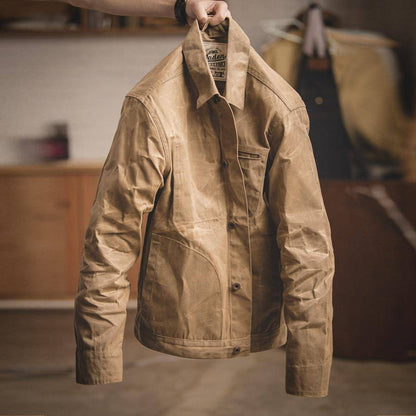 Side profile of a men's khaki outerwear jacket, highlighting its casual yet timeless design.