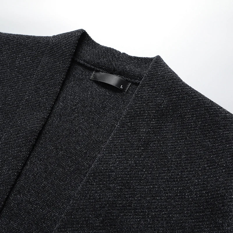 Stylish men's black classic layering cardigan, offering a modern relaxed fit for everyday and smart casual looks.
