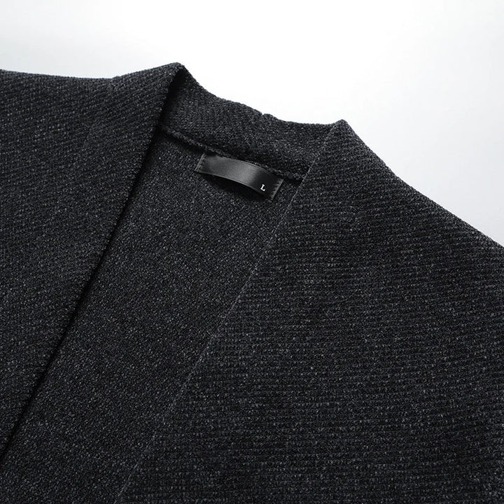 Stylish men's black classic layering cardigan, offering a modern relaxed fit for everyday and smart casual looks.