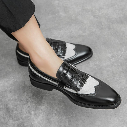 Versatile men's brogue loafers, featuring a fringe accent, suitable for formal or casual settings.