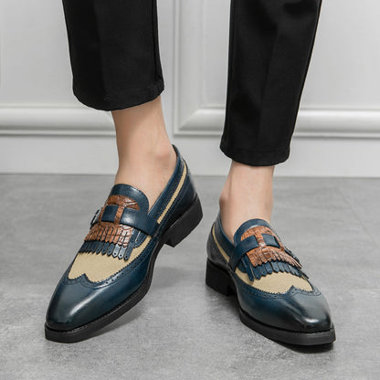 Luxury men's formal shoes: classic brogue loafers with a refined fringe and wingtip design.