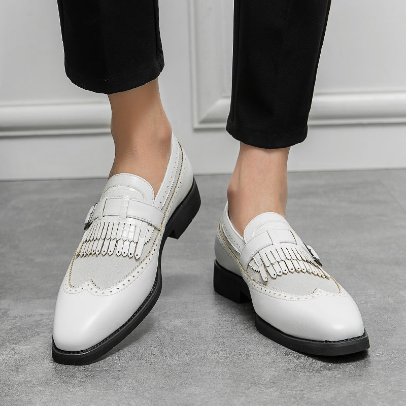 Men's elegant brogue loafers with fringe, offering a blend of traditional and contemporary fashion.