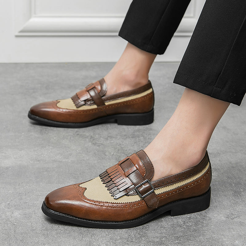 Sophisticated men's dress shoes: slip-on brogue loafers with a distinctive fringe.