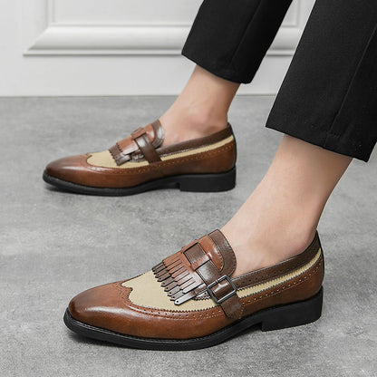 Sophisticated men's dress shoes: slip-on brogue loafers with a distinctive fringe.