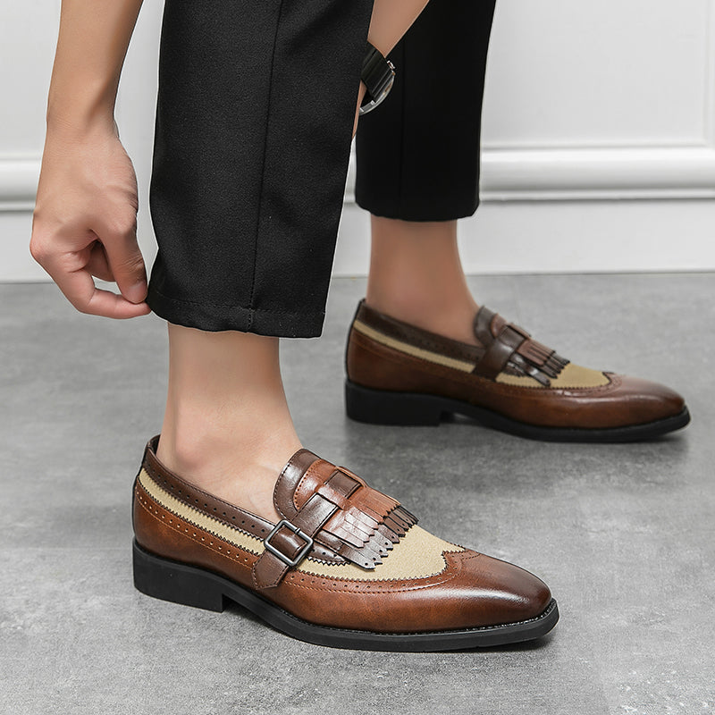 Men's casual yet refined brogue loafers with fringe, offering classic style and comfort.