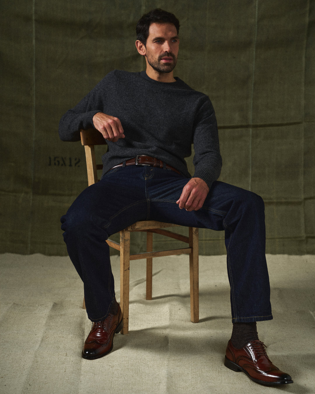 Sleek black leather Oxford brogues, men's dress shoes offering classic style & comfort for formal occasions.
