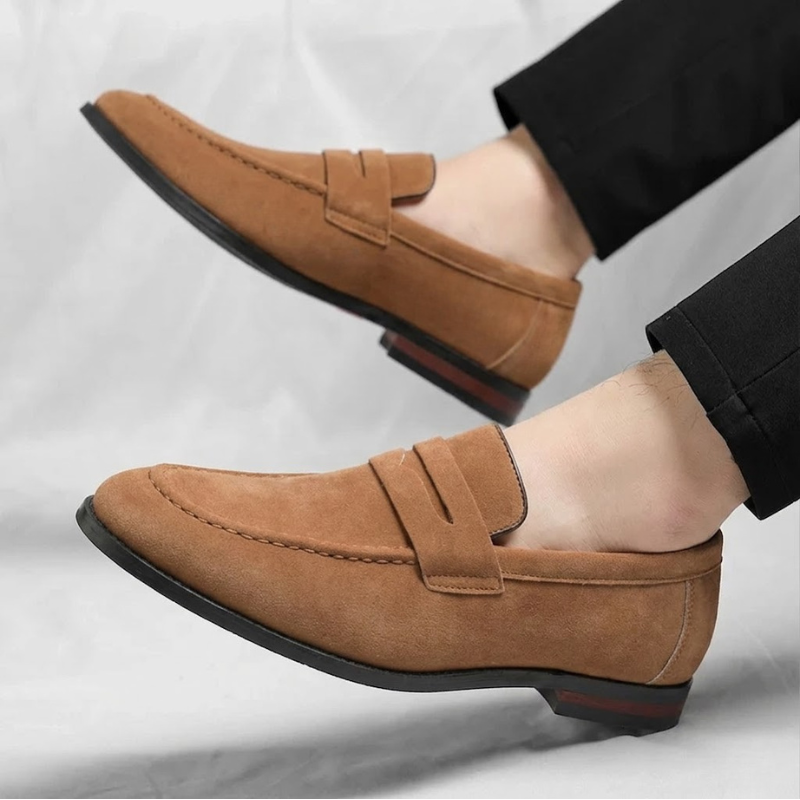 Comfortable men's slip-on penny loafers, perfect for smart casual or dress occasions. Stylish, easy to wear.