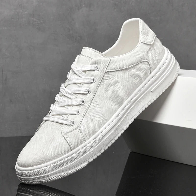 Assortment: men's classic leather sneakers in black, sand & white. Versatile, comfortable casual shoes.