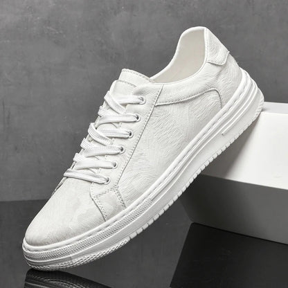 Assortment: men's classic leather sneakers in black, sand & white. Versatile, comfortable casual shoes.