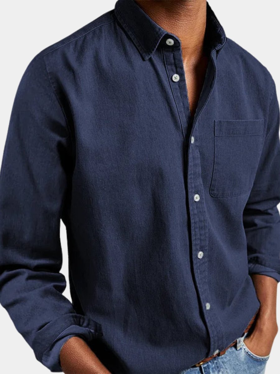Men's classic long sleeve button-up shirt in a versatile solid color, perfect for casual or everyday wear.