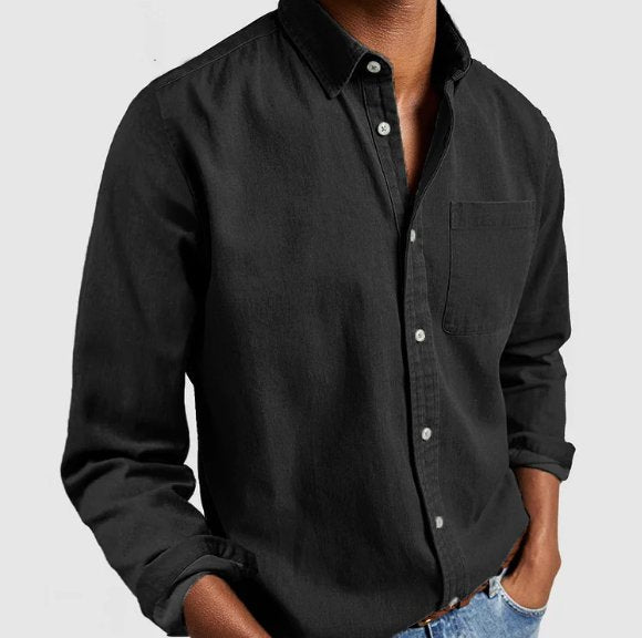 Neatly folded men's classic long sleeve button-up shirt, ready for versatile casual or smart everyday wear.