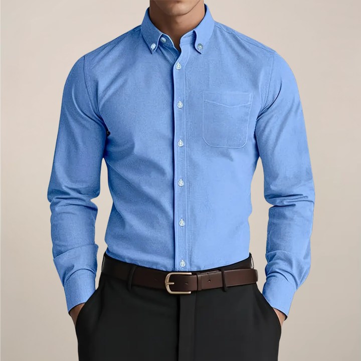 Classic men's long sleeve button-up shirt, a menswear wardrobe essential for all seasons.