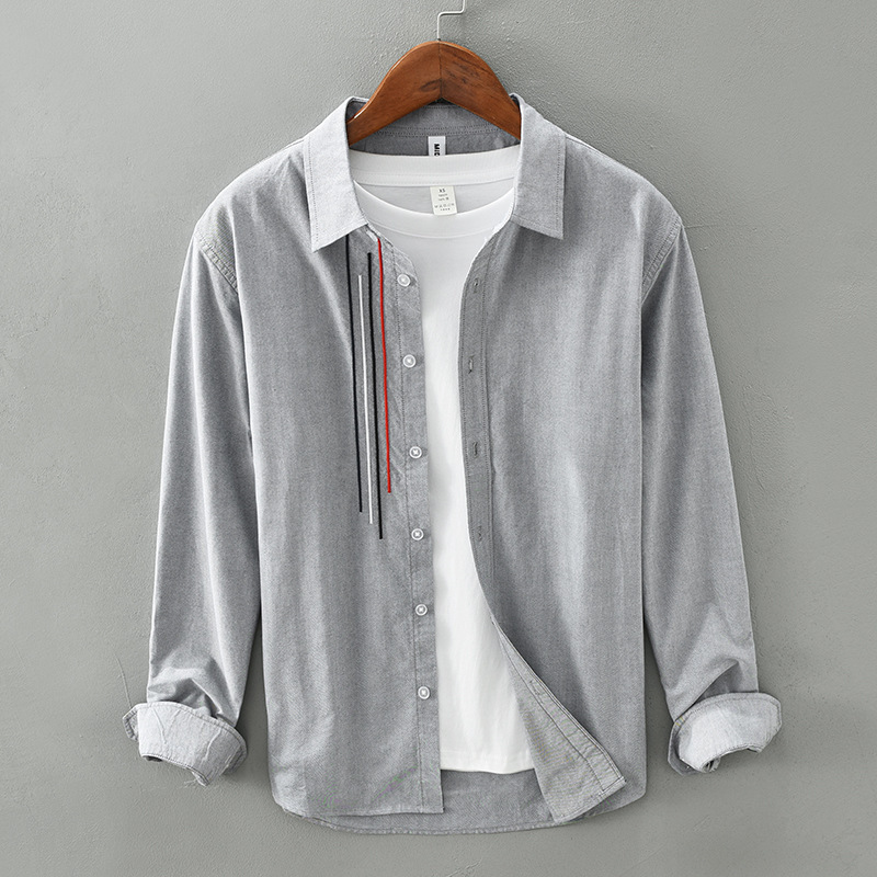 Comfortable men's long-sleeve button-up shirt for casual wear. Soft fabric, versatile for spring & fall outfits.