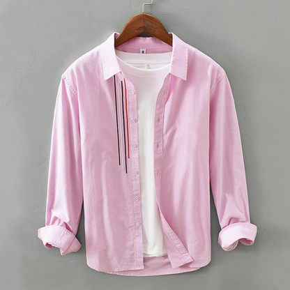 Stylish men's long-sleeve polo shirt, ideal for casual comfort. Versatile design for spring & fall everyday wear.