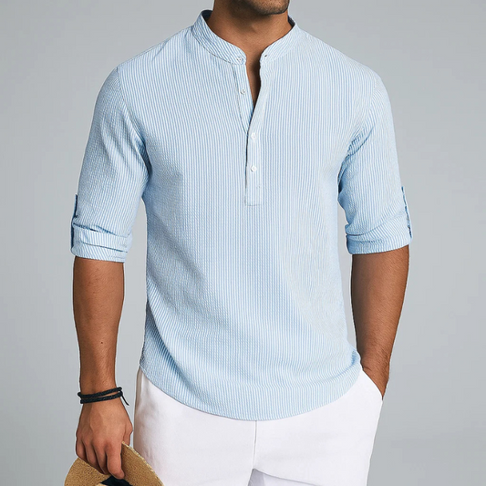 Men's classic long sleeve Henley shirt in a comfortable fabric, ideal for everyday casual wear & modern style.