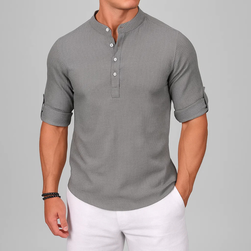 Tailored fit men's Henley shirt with a stylish button-front closure, perfect for versatile, modern men's fashion.