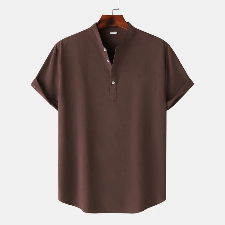 Smart casual men's Henley shirt with classic button placket, ideal for versatile everyday fashion.