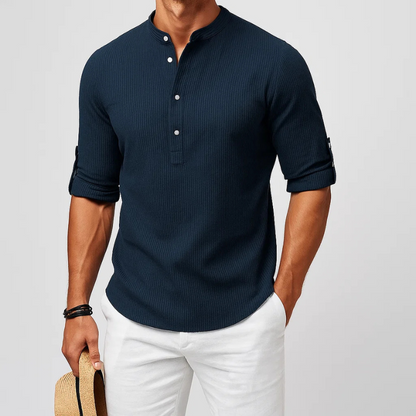 Modern style men's long sleeve Henley shirt featuring a button front, offering tailored comfort for casual fashion.