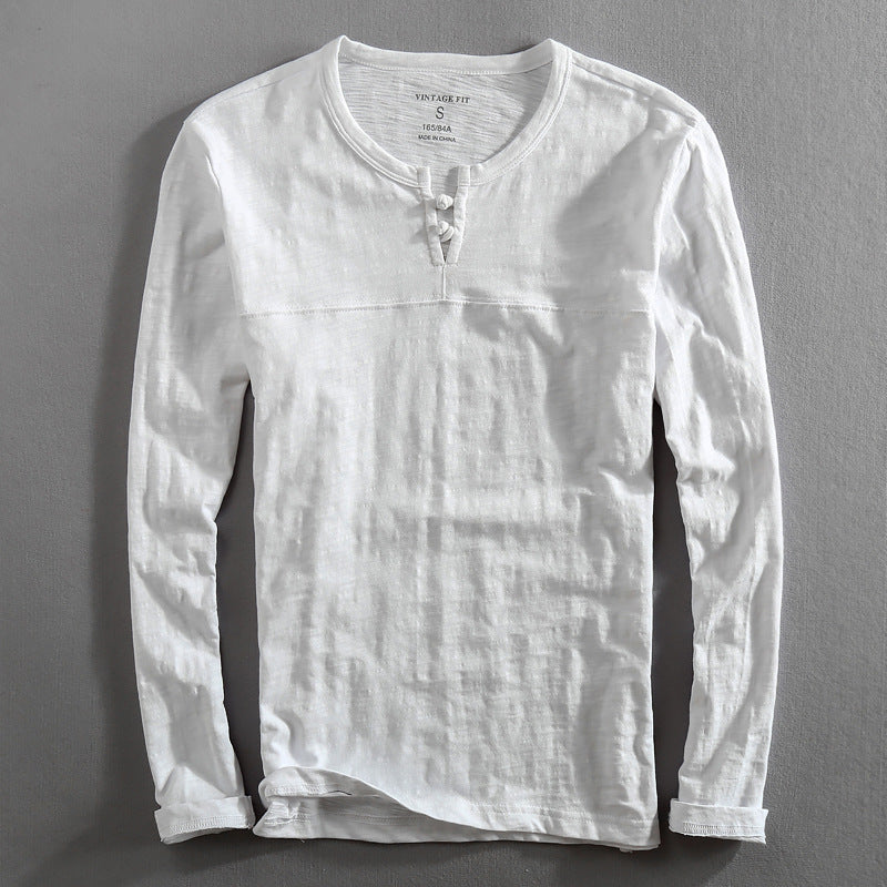 Comfortable cotton blend men's Henley shirt, long sleeve, in a classic fit for everyday wear. A casual wardrobe essential.