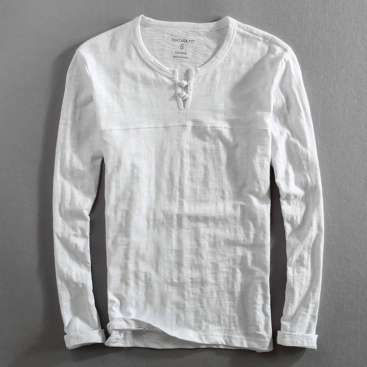 Comfortable cotton blend men's Henley shirt, long sleeve, in a classic fit for everyday wear. A casual wardrobe essential.