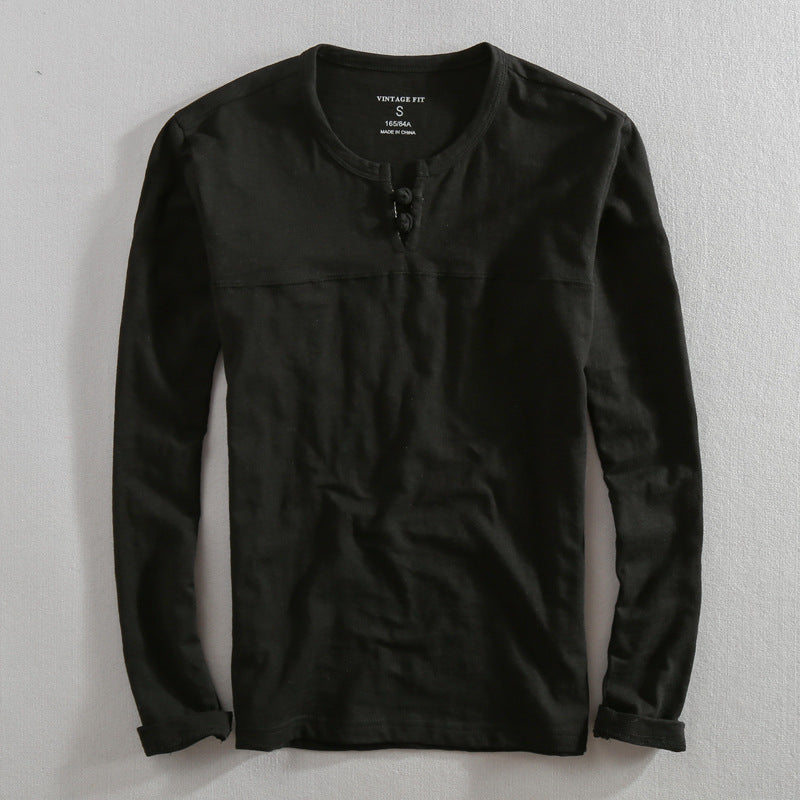 Navy men's long sleeve Henley button shirt, exuding classic style & comfort for casual outings. A men's fashion staple.