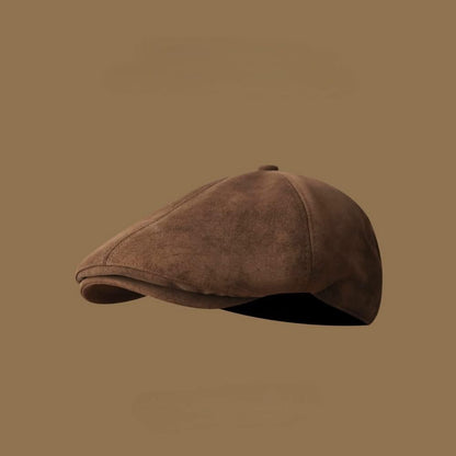 Brown men's newsboy hat. Classic driving cap, vintage style headwear for a stylish and timeless look.