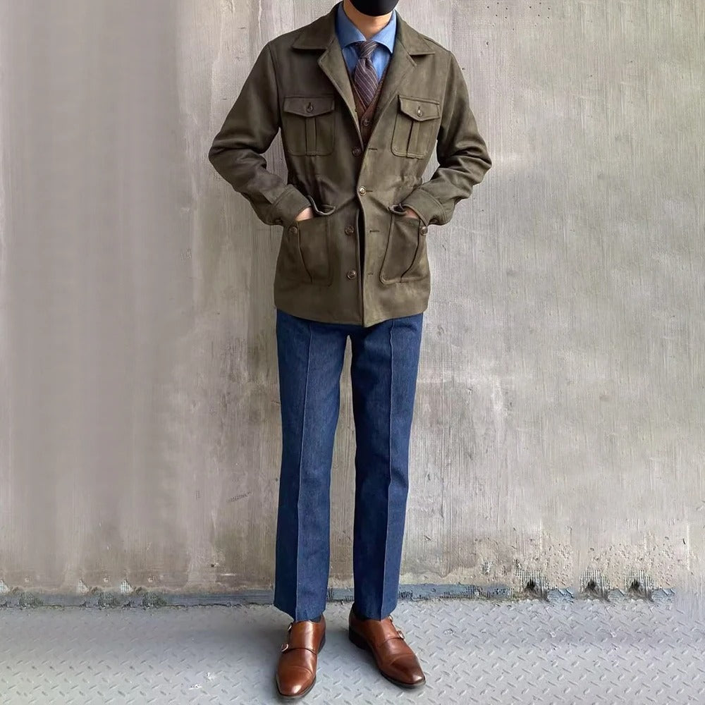 Detail shot of a men's classic field jacket, showcasing its four practical pockets and durable button-front closure.