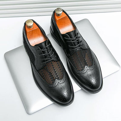 Classic men's Oxford wingtip brogue dress shoes. Comfortable, breathable formal footwear for stylish men.