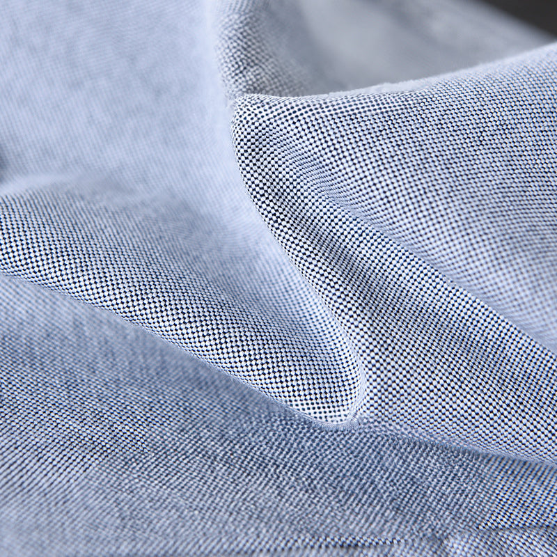 Modern classic men's oxford shirt, long sleeve, button down, elevated with stylish ribbon trim.