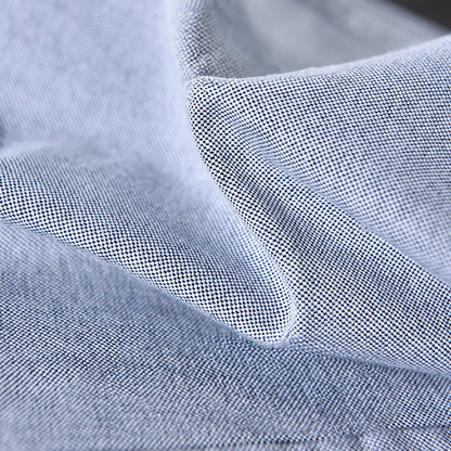 Modern classic men's oxford shirt, long sleeve, button down, elevated with stylish ribbon trim.