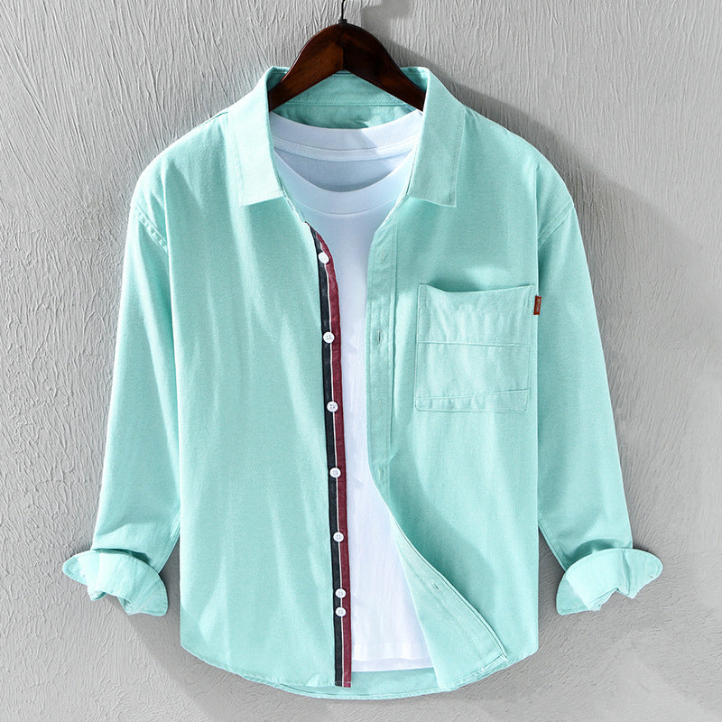 Elegant men's button down Oxford shirt, classic fit, long sleeve, featuring distinctive ribbon trim.