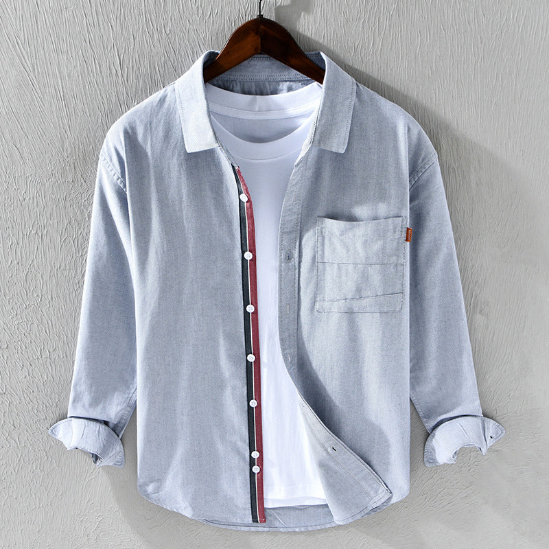 Polished men's long sleeve Oxford shirt, classic design with modern ribbon trim detail for smart casual occasions.