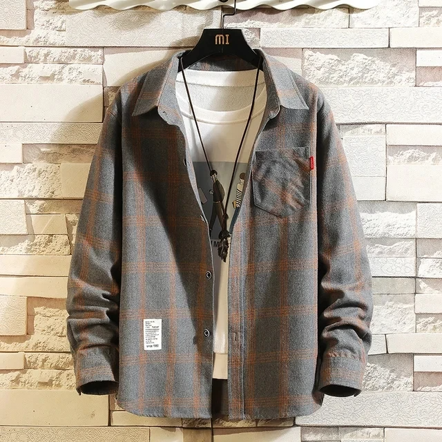 Men's button-up plaid flannel shirt with long sleeves. A classic comfortable style for everyday casual wear.