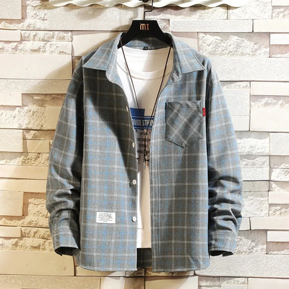 Soft men's flannel plaid shirt, long sleeve button-up. A comfortable classic top for modern casual fashion.