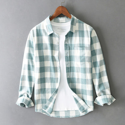 Classic men's plaid button-up shirt. A versatile long-sleeve casual wear essential for everyday comfort.