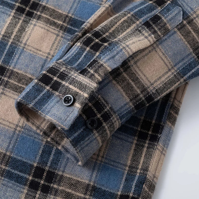 Stylish men's long sleeve plaid flannel shirt, ideal for fall & winter style, button-down front.