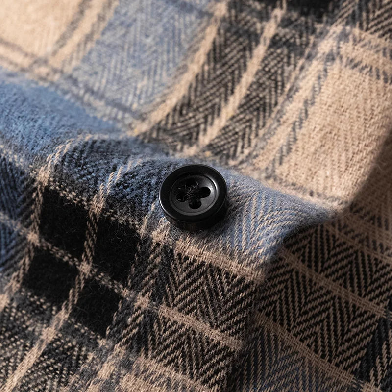 Men's button-down long sleeve plaid flannel shirt, versatile for fall fashion & winter layering.