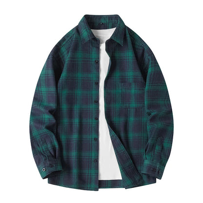 Men's vintage-style green plaid flannel shirt, button-down for timeless fall & winter fashion.