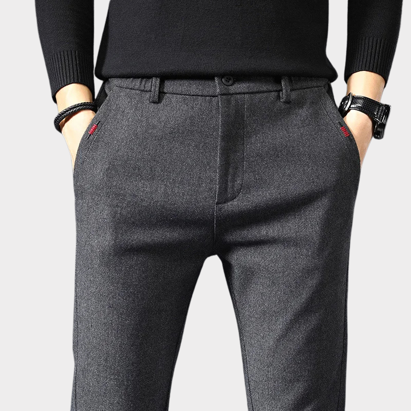 Close-up of the comfortable, wrinkle-resistant fabric on stylish men's classic slim fit pants, ideal for everyday fashion.
